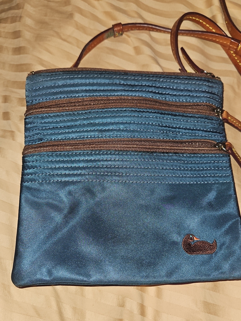 Dooney & Bourke Blue Quilted Crossbody Messenger Bag with Brown Trim